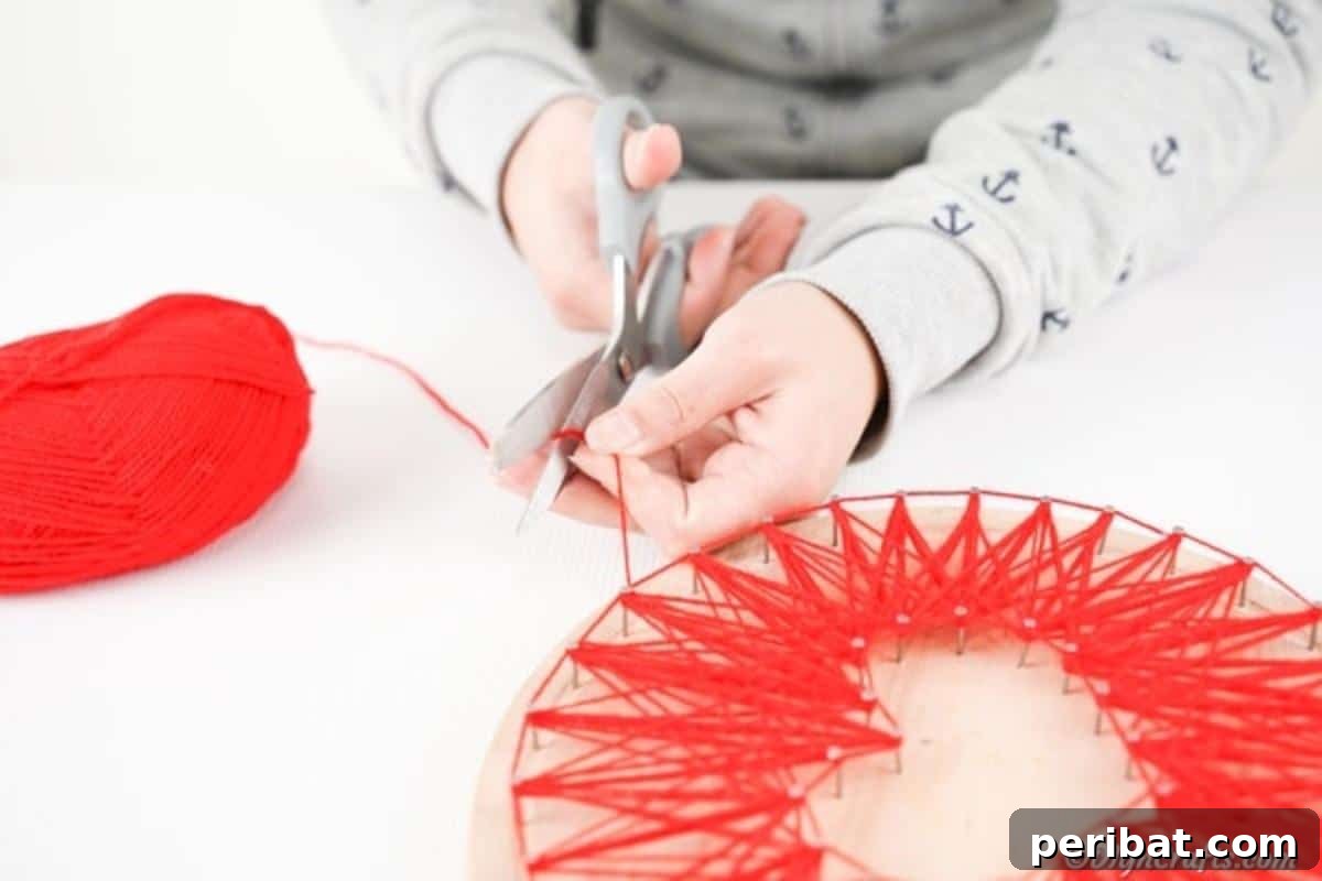 Heartfelt Valentine String Art Decoration 15 Clipping the end of the string for heart