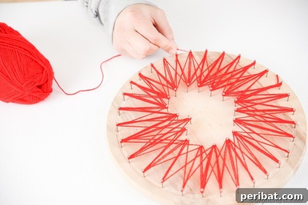 Heartfelt Valentine String Art Decoration 22 Wrapping string around nails for string art heart
