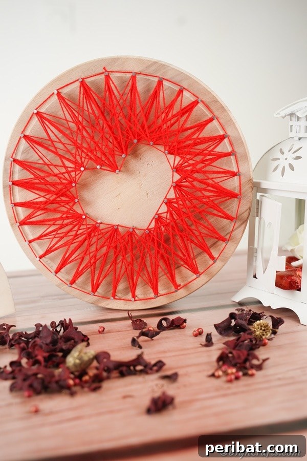 Heartfelt Valentine String Art Decoration 24 Heart string art on counter with dried flowers
