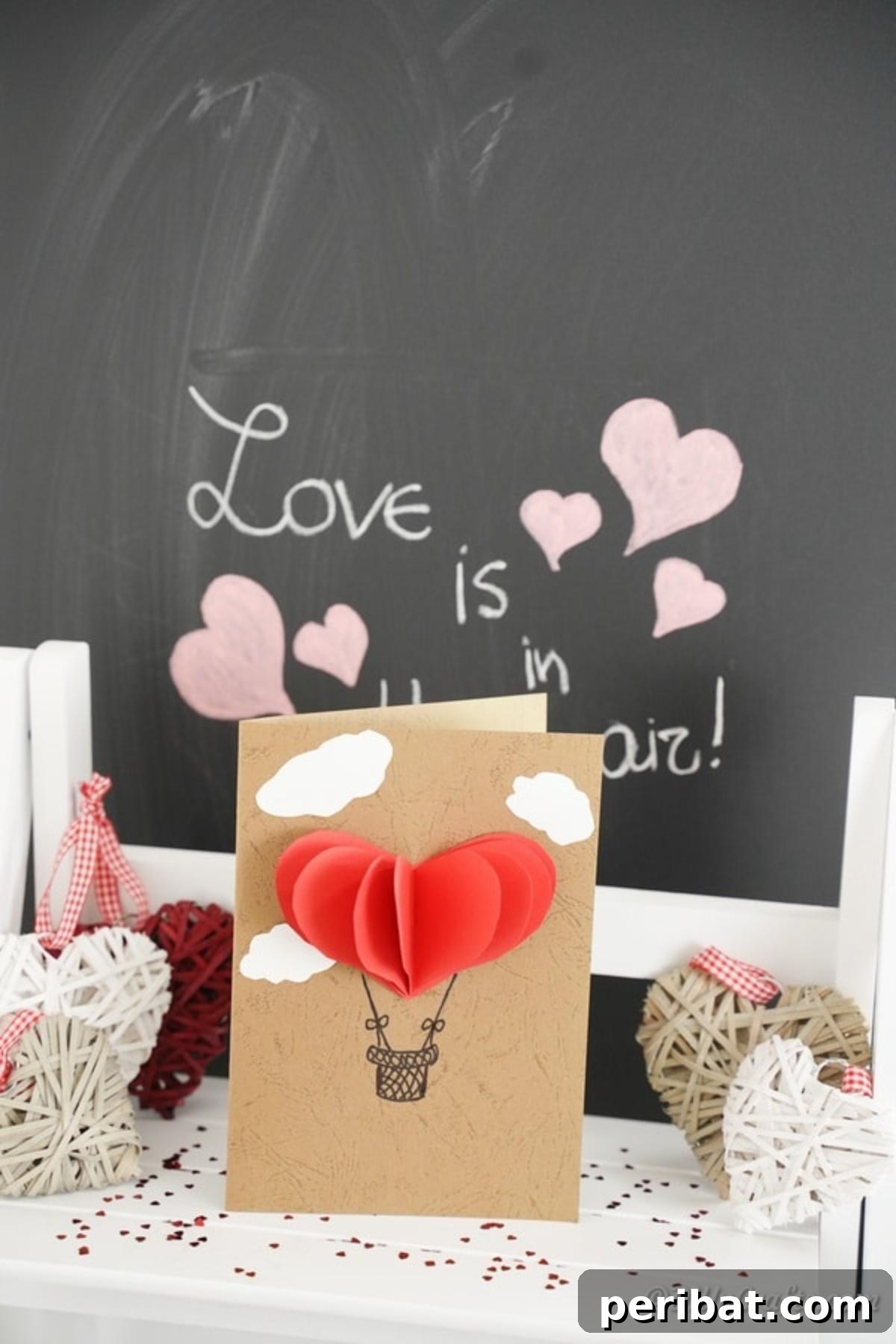 3D Valentine's Day card in front of chalkboard