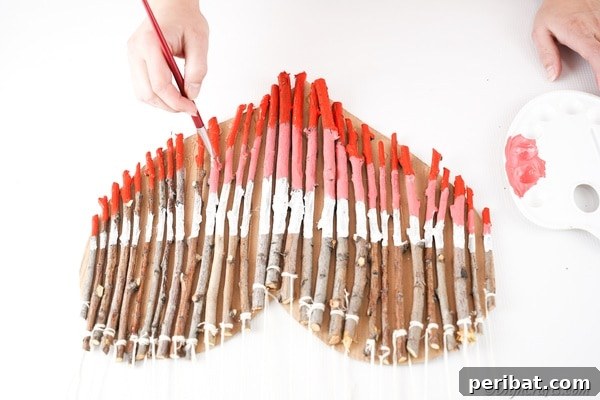 Hand-Painted Rustic Twig Heart Ornament 28 Finishing white and pink paint on heart decoration
