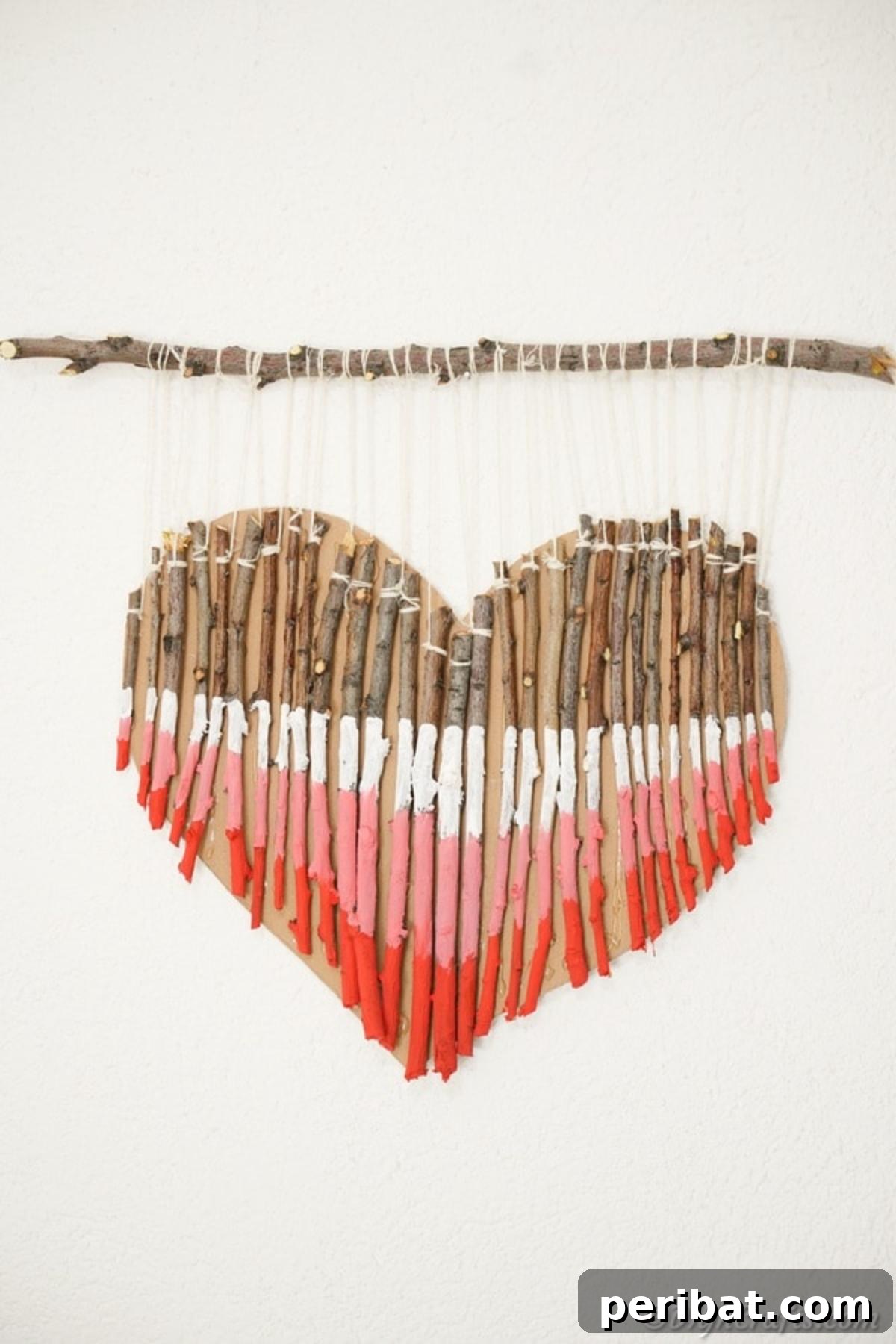 Hand-Painted Rustic Twig Heart Ornament 5 Painted twig wood heart wall art on white wall