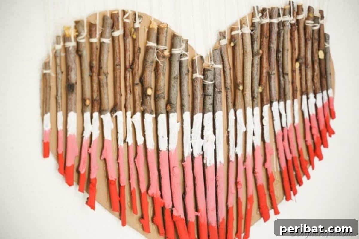 Hand-Painted Rustic Twig Heart Ornament 8 Close up painted twig heart on wall