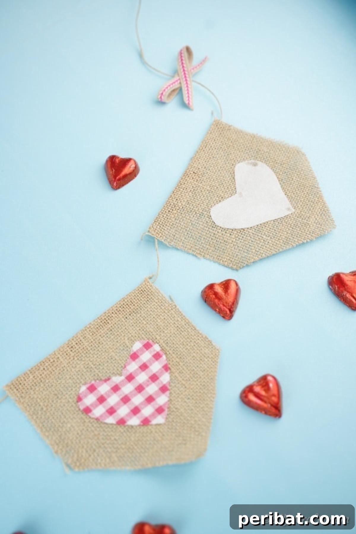 Rustic Love Burlap Heart Garland 5 Valentine garland on blue background with heart candy