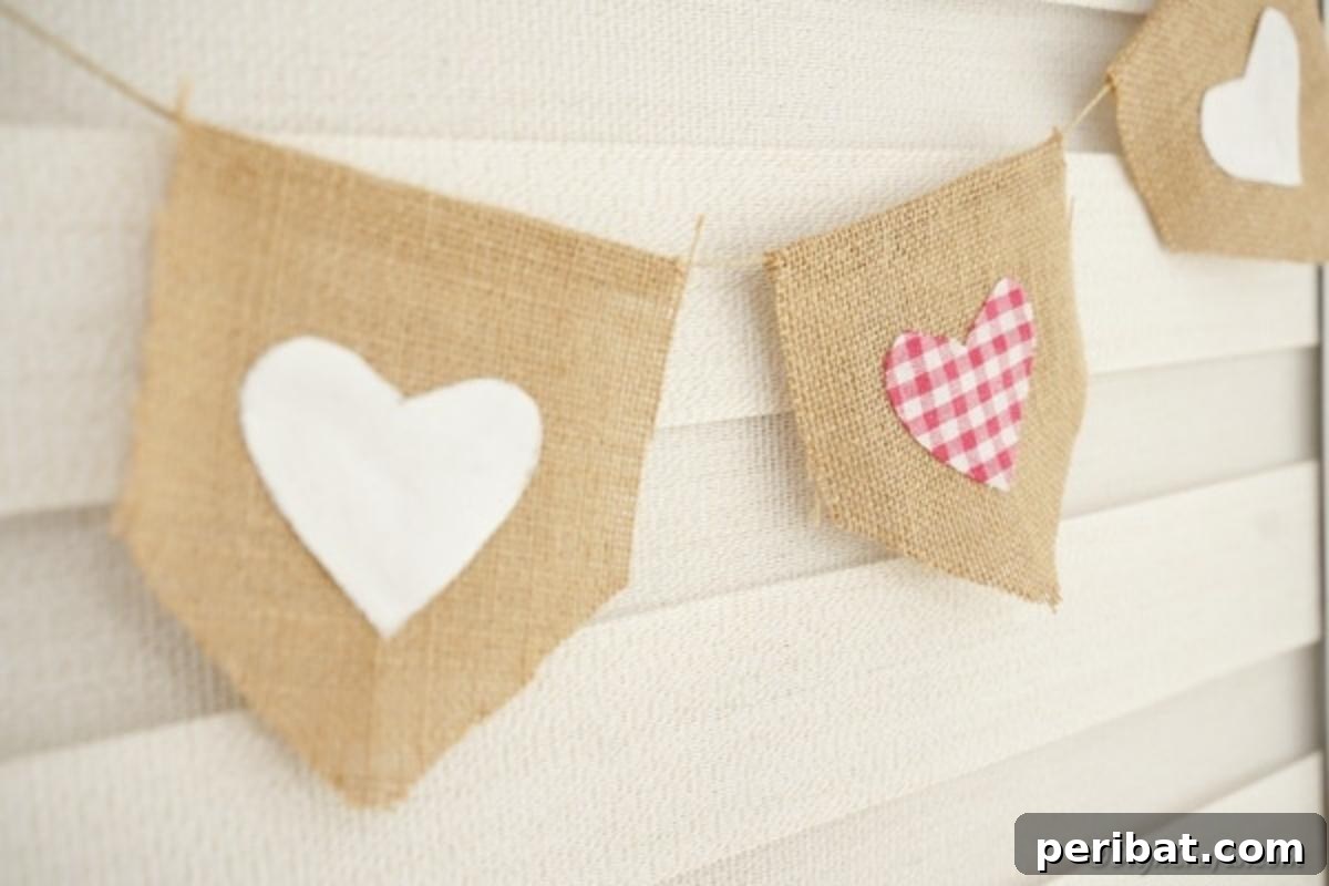 Rustic Love Burlap Heart Garland 6 Burlap banner hanging against siding on house