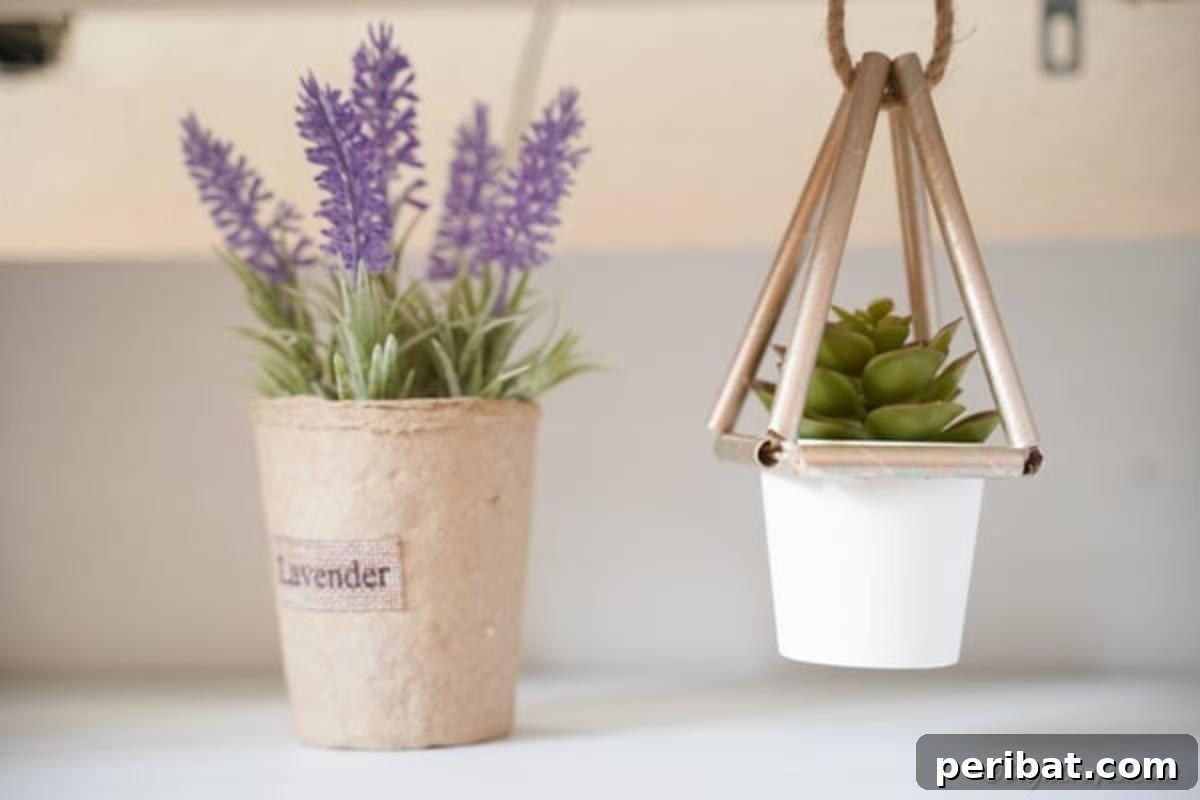 A delicate succulent planter, handmade from paper straws, hangs gracefully in a sunlit window, positioned next to a vibrant lavender plant, enhancing the room's natural beauty.