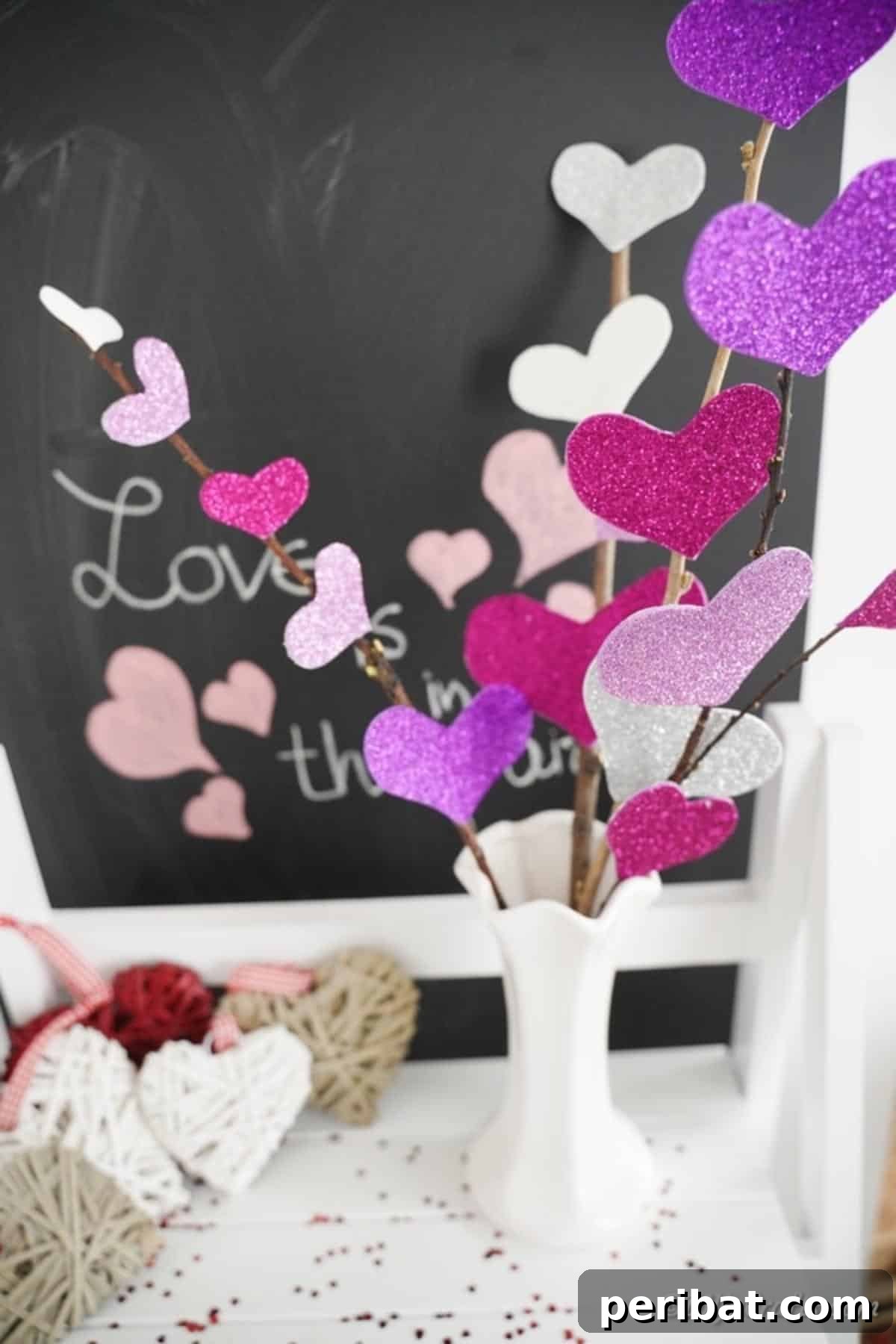 Heart flower bouquet on shelf in front of chalkboard