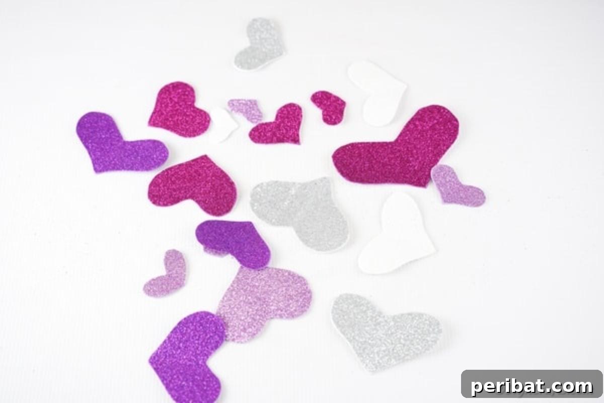 Colorful hearts on white table