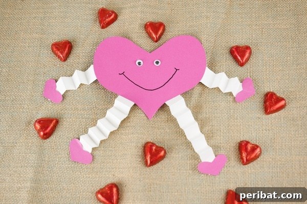 paper heart decoration on burlap with heart candy