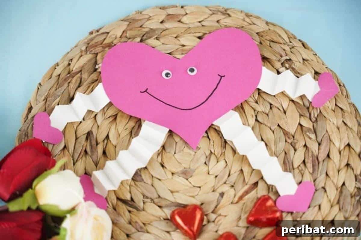 Little Hands, Loving Hearts: Kids' Valentine Paper Craft 4 A charming paper heart decoration resting on a woven mat
