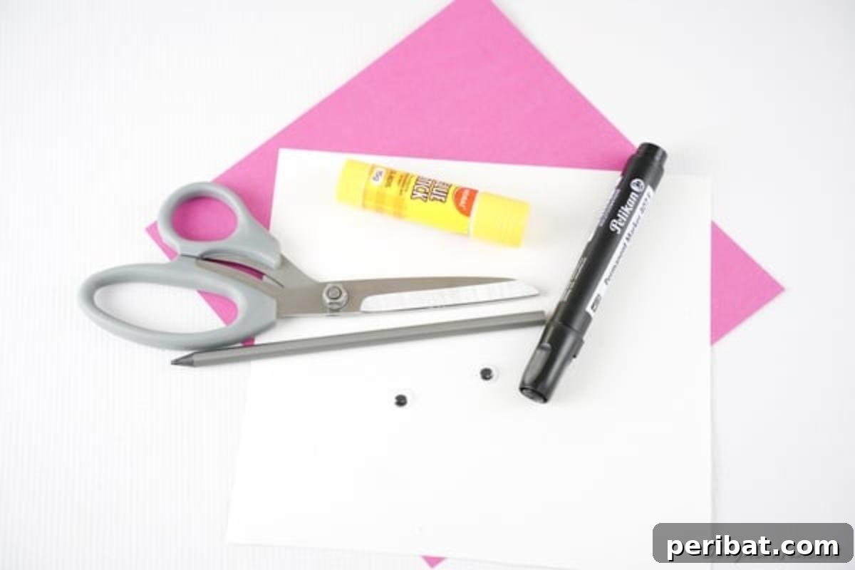 Little Hands, Loving Hearts: Kids' Valentine Paper Craft 7 Supplies neatly laid out for making the paper heart decoration