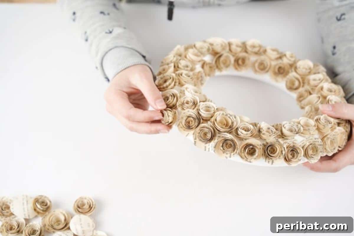 Romantic Book Page Rose Heart Wreath 15 Adding paper roses to foam wreath form