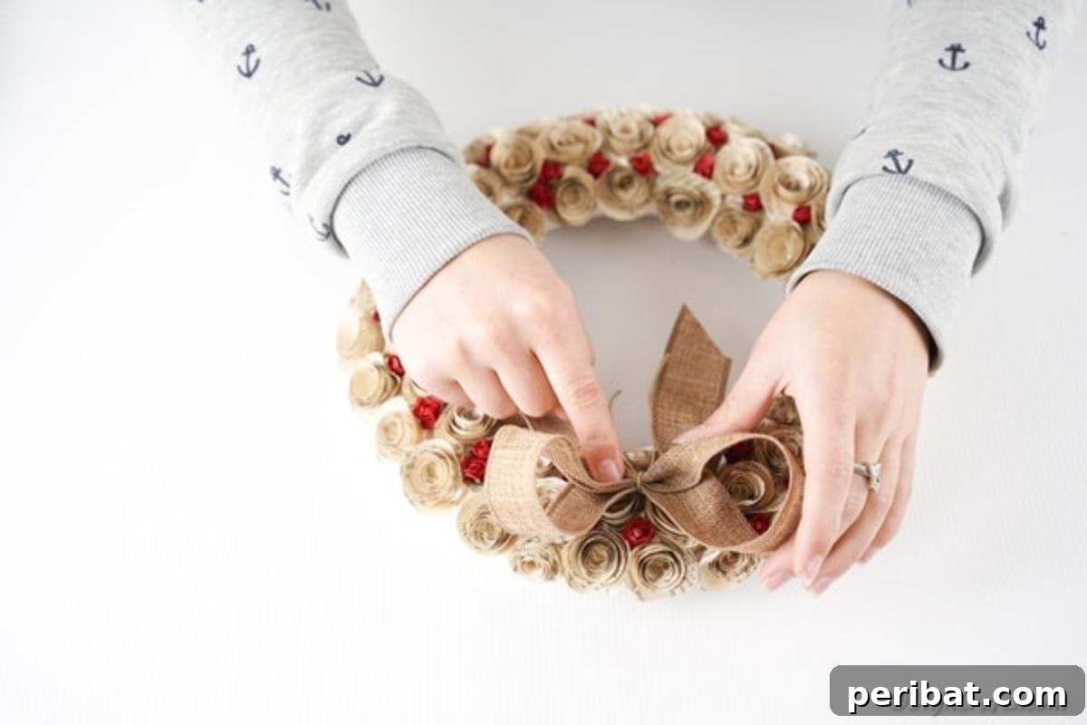 Romantic Book Page Rose Heart Wreath 18 Attaching burlap bow to quilled rose wreath
