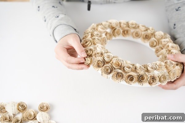 Romantic Book Page Rose Heart Wreath 26 Adding paper roses to foam wreath form