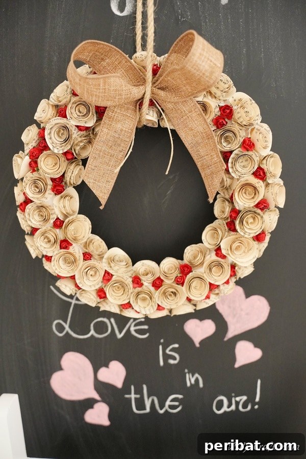 Romantic Book Page Rose Heart Wreath 30 Finished quilled rose wreath displayed on a brick wall
