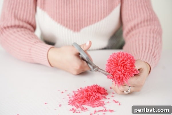 Trimming excess off of pom pom monster