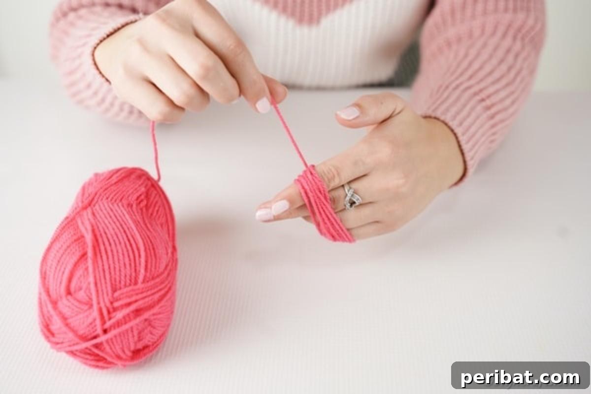 Wrapping yarn around palm of the hand