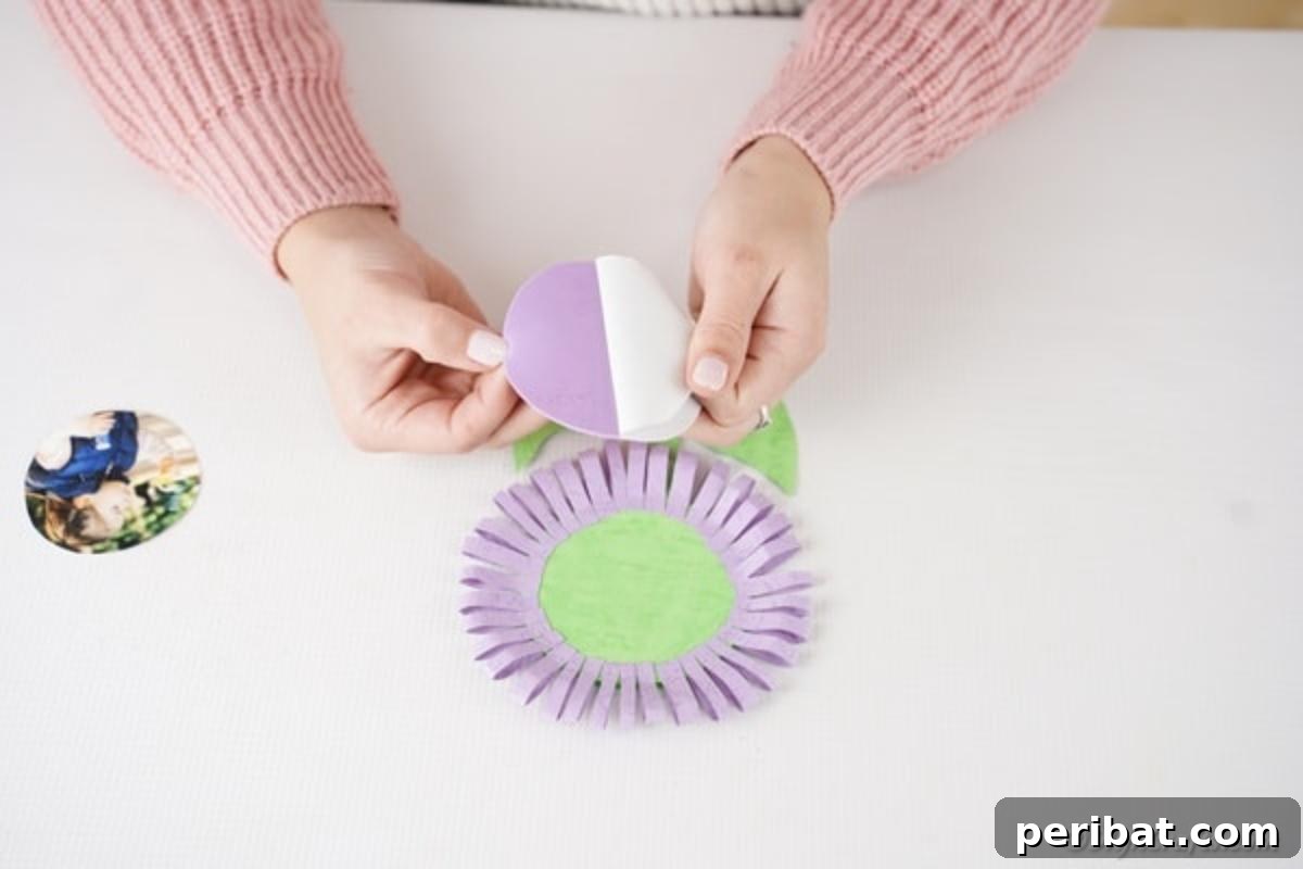 Craft Your Own Paper Flower Photo Keepsake 12 Trimming purple glitter paper to fit the card