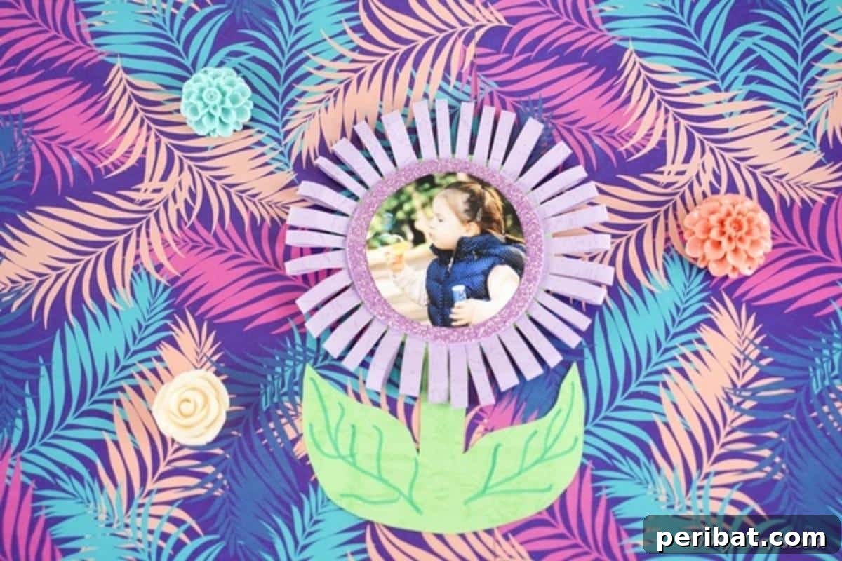 Craft Your Own Paper Flower Photo Keepsake 3 Flower photo card resting on a bright leaf print surface
