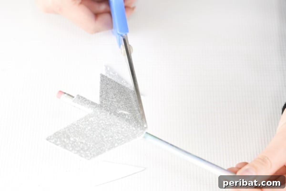 Make Your Own Valentine's Love Arrows 10 Carefully trimming the silver foam paper on the pencil into a distinct arrow shape
