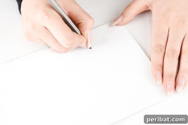 Drawing a heart shape on foam paper