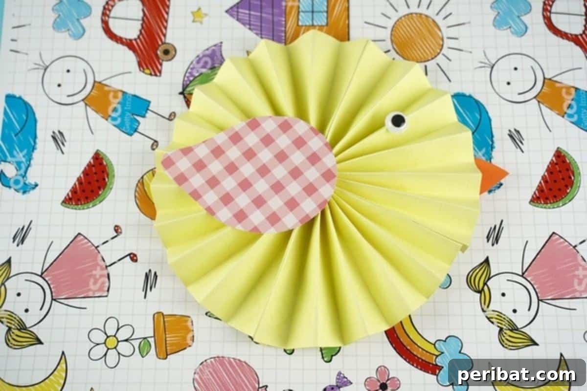 Simple & Sweet: Crafting Paper Birds with Kids 4 A completed colorful paper bird resting on a table, surrounded by various sheets of vibrant patterned paper, illustrating the creative possibilities with different paper choices for crafting.