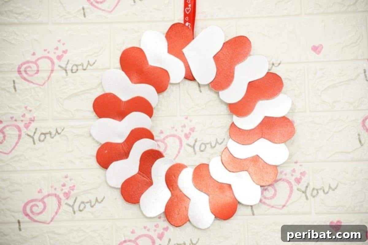 Valentine's Day wreath on a white surface with i love you stamp