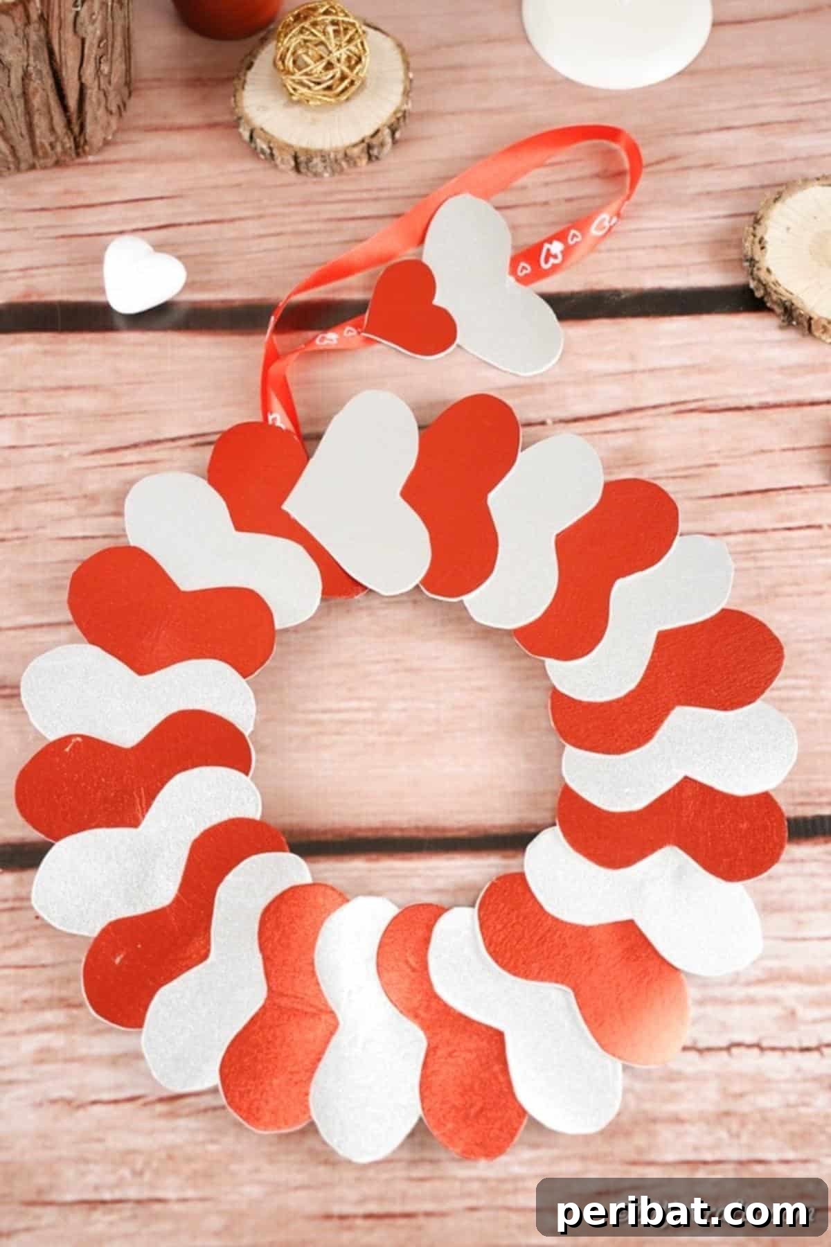 Heart valentine's day wreath laying on wood surface