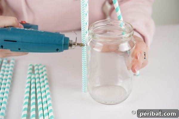 Gluing straws onto mason jar
