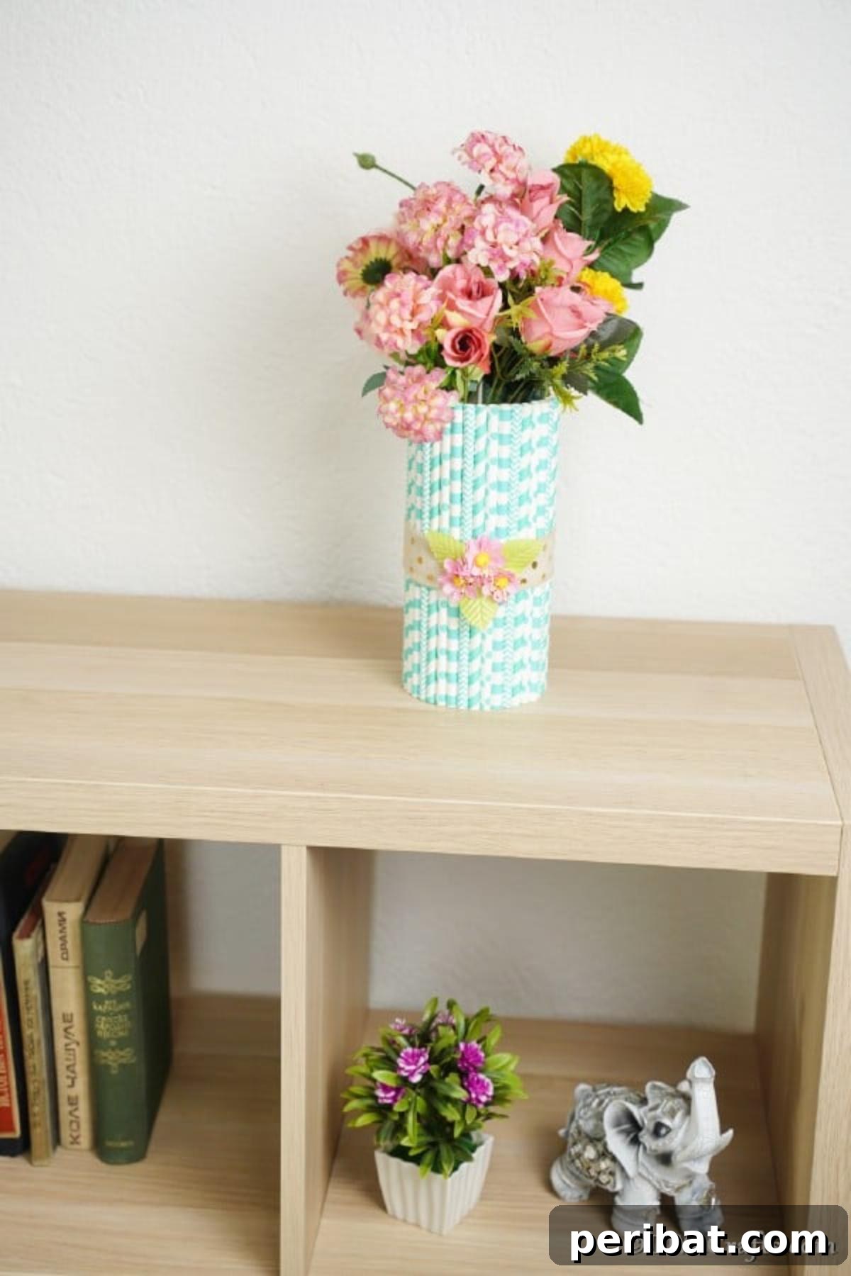 Handmade Straw-Embellished Mason Jar Vase 5 Elegantly crafted mason jar vase with blue and white patterned straws, placed on a wooden shelf