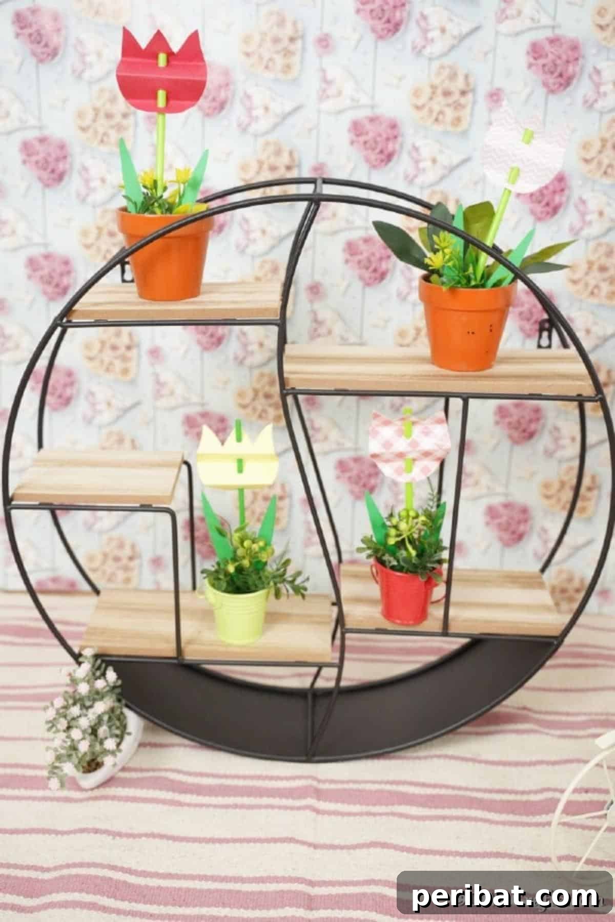 Create Charming Spring Paper Tulips 3 Display of colorful paper tulips arranged in small flower pots on a rustic wire shelf