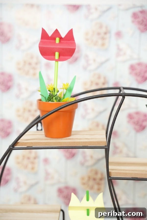 Create Charming Spring Paper Tulips 22 Red paper tulip in a flower pot on wire shelf