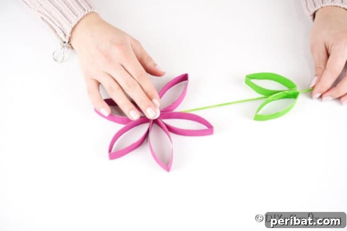 Attaching the stem of the flower to the flower head