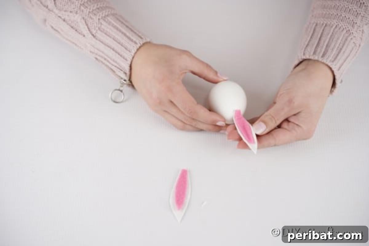 Craft Adorable Easter Bunny Eggs 12 Attaching ears to egg for Easter bunny craft