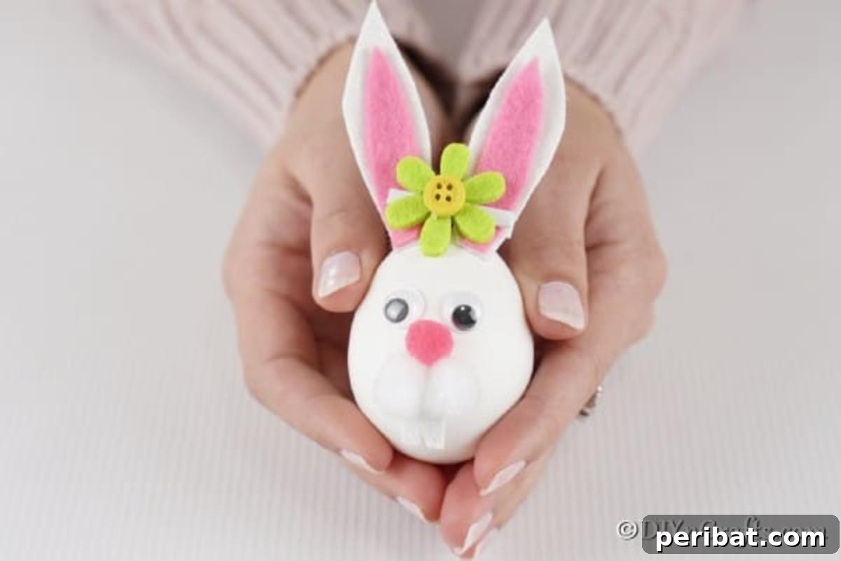 Craft Adorable Easter Bunny Eggs 15 Easter egg bunny in hands