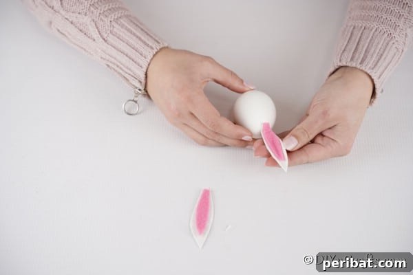 Craft Adorable Easter Bunny Eggs 20 Attaching ears to egg for Easter bunny craft