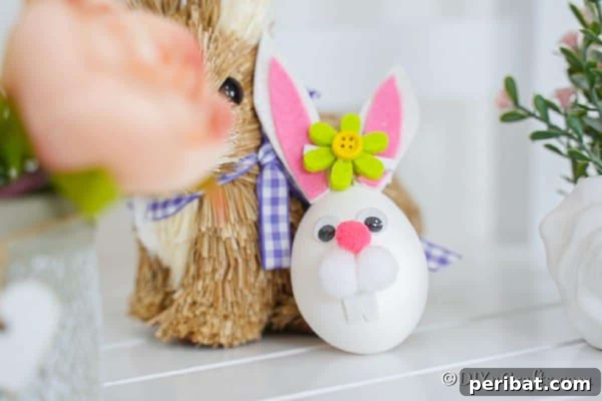 Craft Adorable Easter Bunny Eggs 5 Easter bunny egg leaning against stuffed bunny