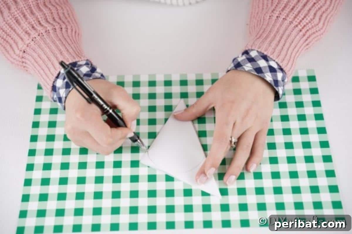 Adorable Mini Easter Basket Craft 7 Tracing a rounded edge onto folded paper for the basket template
