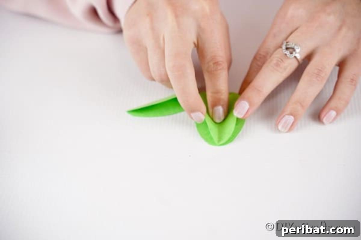 DIY Upcycled Book Page Easter Egg Garland Tutorial 16 Attaching layers of egg shaped paper