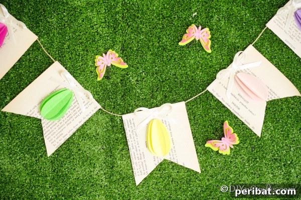 DIY Upcycled Book Page Easter Egg Garland Tutorial 21 Easter egg garland with 3d eggs on grass