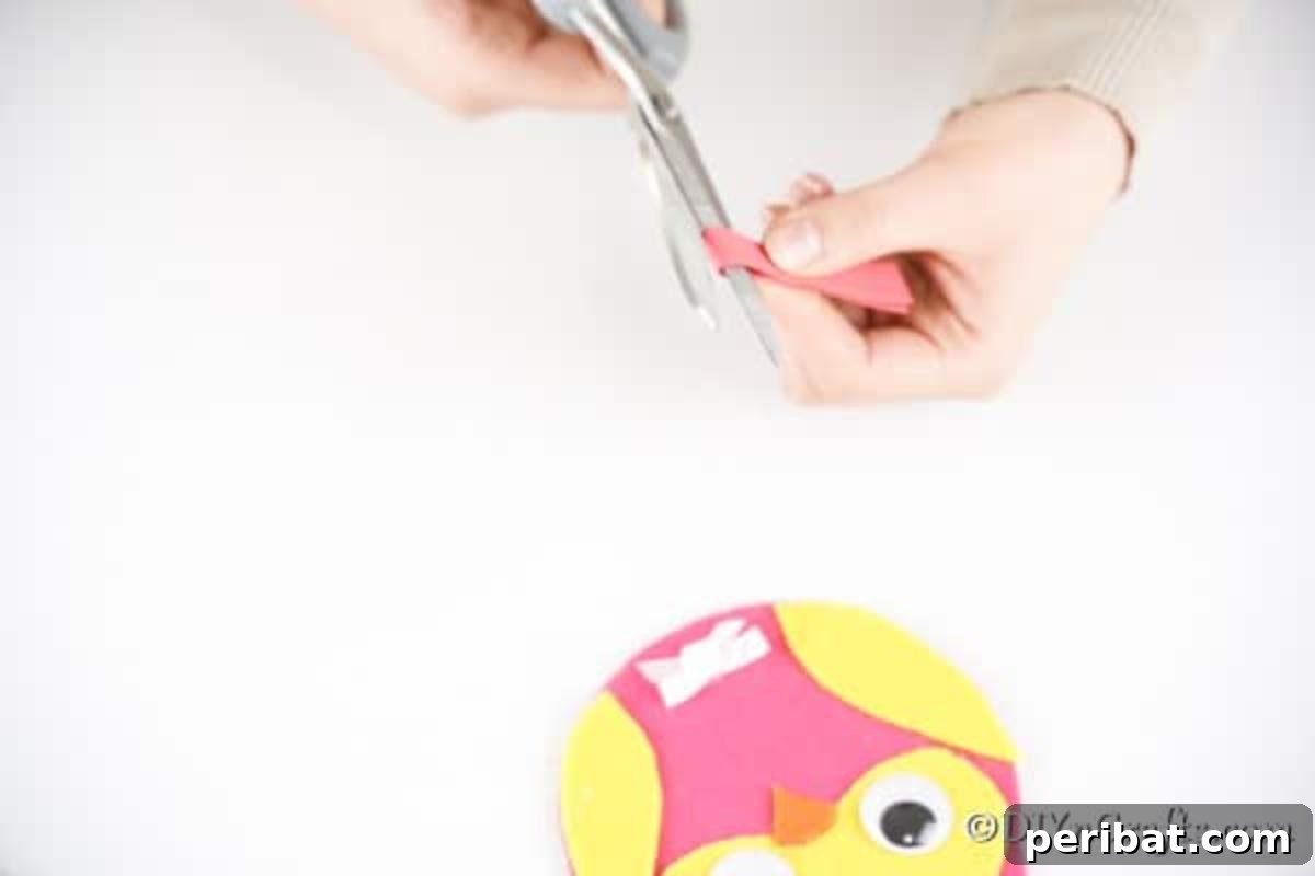 Craft a Whimsical CD Owl Wall Decor 17 Cutting legs for bottom of upcycled cd owl messenger