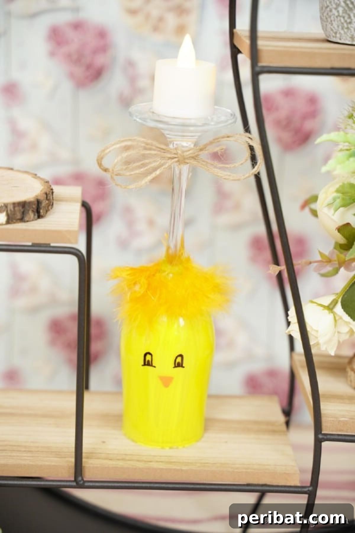 Adorable DIY Chick Wine Glass Luminary 6 A charming painted chicken wine glass decoration proudly displayed on a rustic wood and wire shelf, blending handmade craft with home decor.