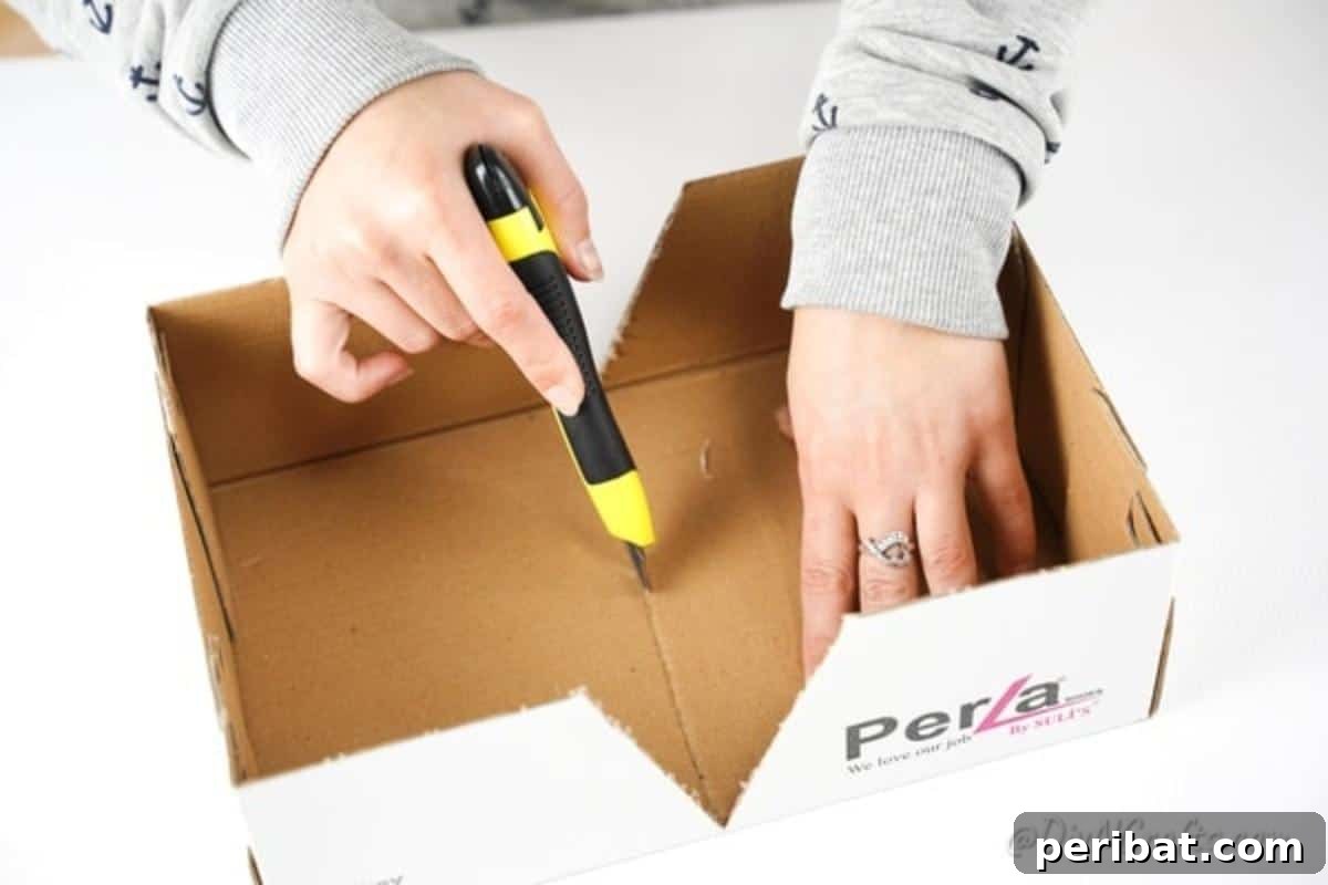 Charming Repurposed Cardboard Organizer 11 Illustration of scoring the middle of the box to facilitate a clean and crisp fold