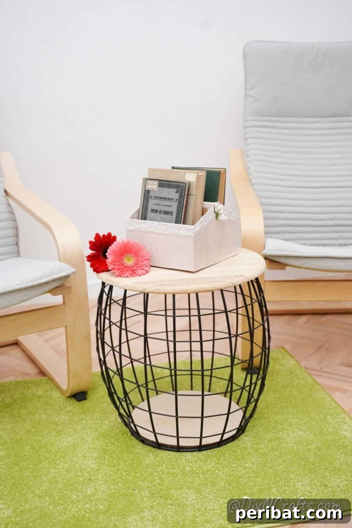 Charming Repurposed Cardboard Organizer 21 Final view of the cardboard box organizer filled with books, gracefully placed on a stylish wire and wood side table