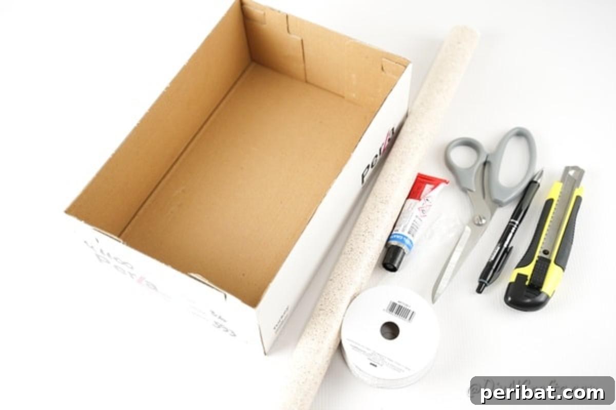 Charming Repurposed Cardboard Organizer 7 Collection of supplies for making the cardboard organizer box: cardboard, contact paper, glue, scissors, craft knife, ruler, pen