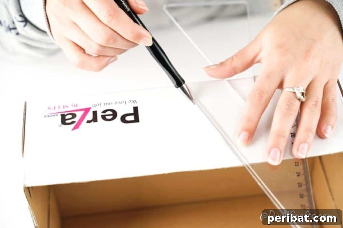 Charming Repurposed Cardboard Organizer 8 Detailed image showing how to measure and mark a cardboard box for the V-shaped organizer design