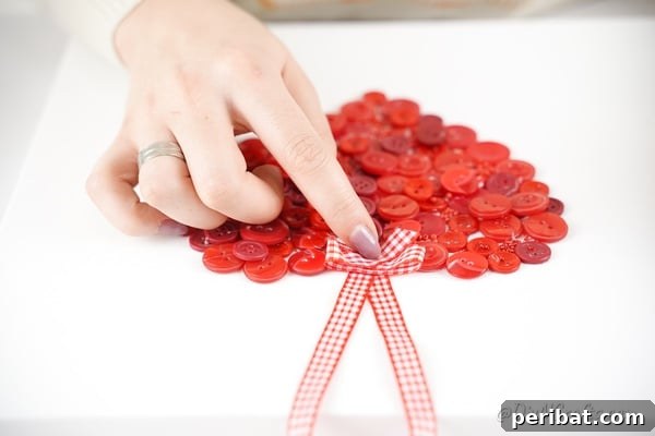 Charming Button Heart Canvas Decor 21 Attaching ribbon to top of button heart