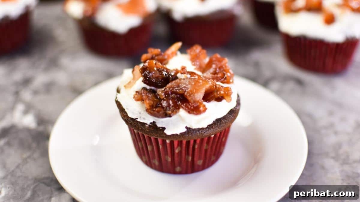 Bacon Beyond Belief: 26 Recipes for an Unforgettable Feast 15 Decadent chocolate cupcakes topped with maple-kissed cream cheese frosting and candied bacon pieces.