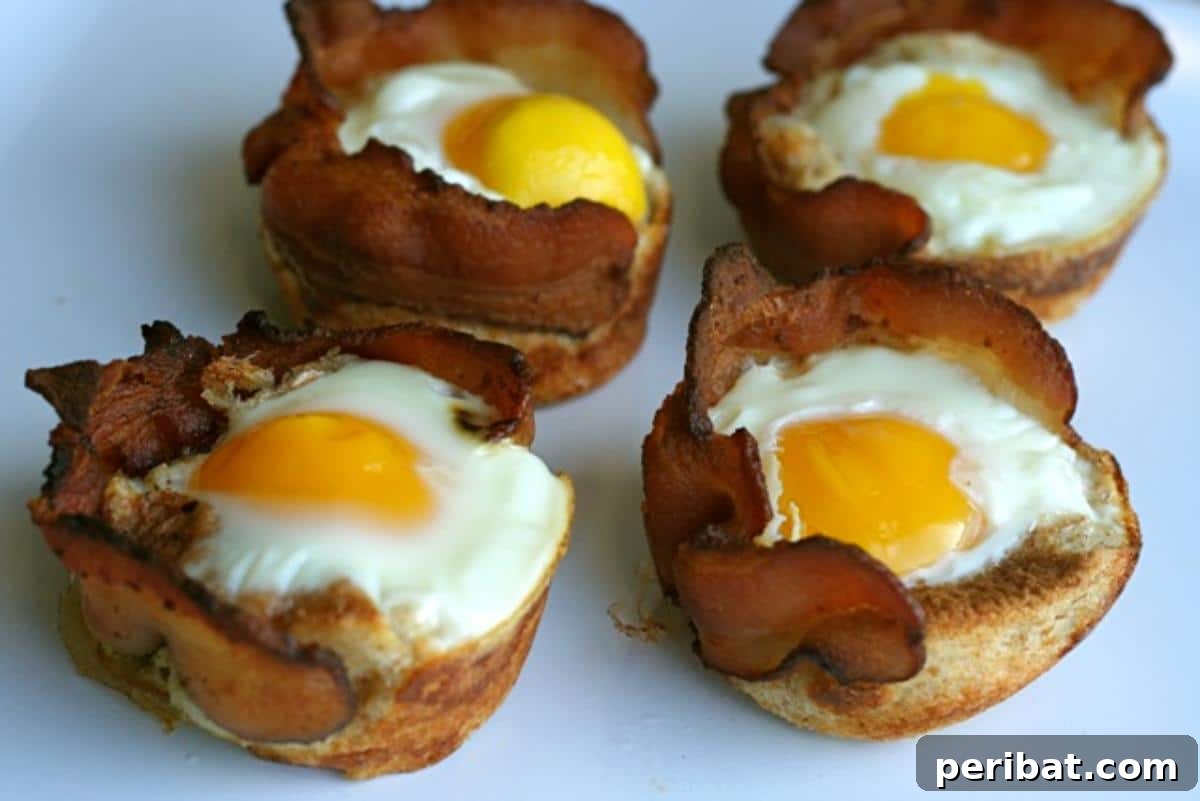Bacon Beyond Belief: 26 Recipes for an Unforgettable Feast 10 Individual breakfast cups made with toast, crispy bacon, and a baked egg, customizable with runny or firm yolks.