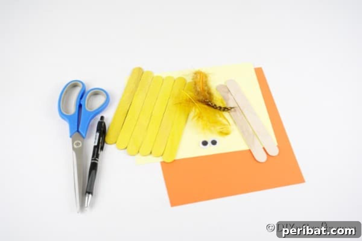 Colorful Craft Stick Chicken Painting 8 A neatly organized collection of craft supplies including paint, sticks, googly eyes, and paper, ready for making a popsicle stick chick.